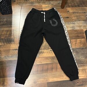 Women's Black Joggers with Leopard Print by [Brand]